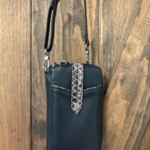 Chic Black Crossbody Bag with Snakeskin Accent